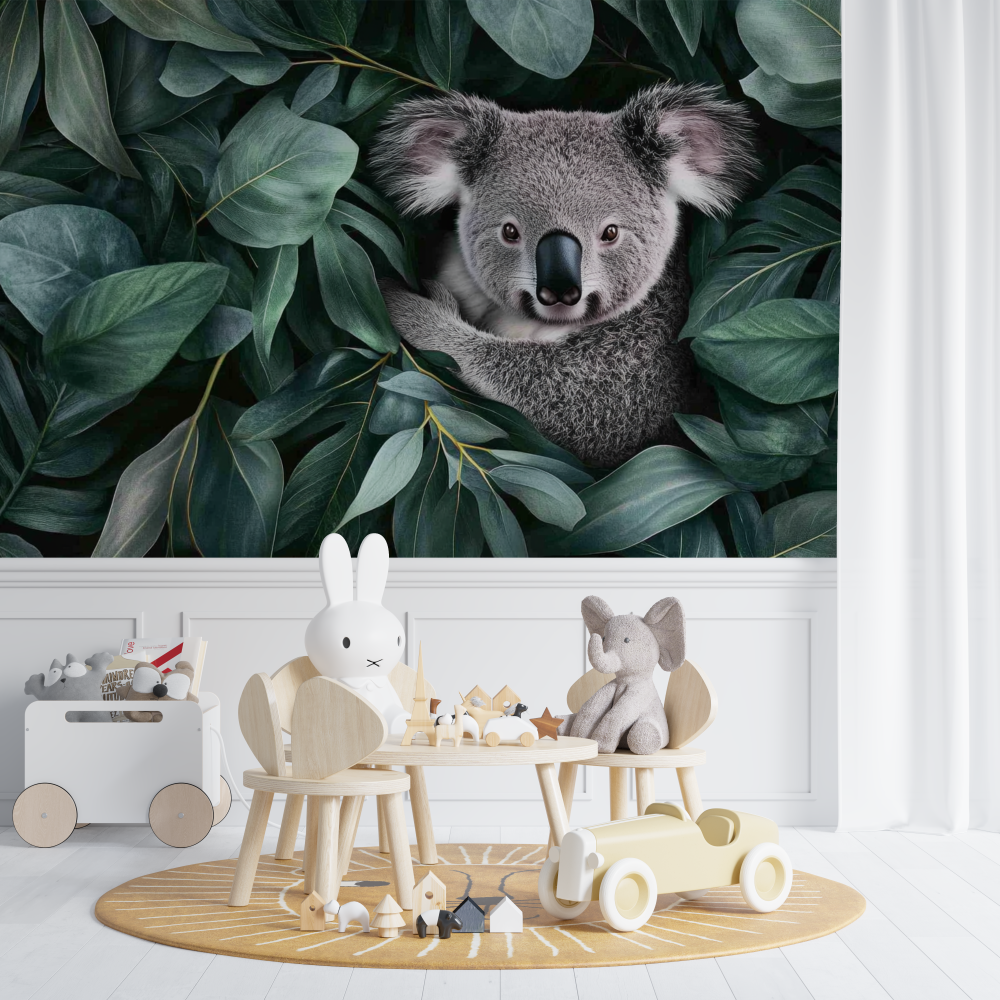 Papier peint koala dans un cocon de feuilles chambre de bebe