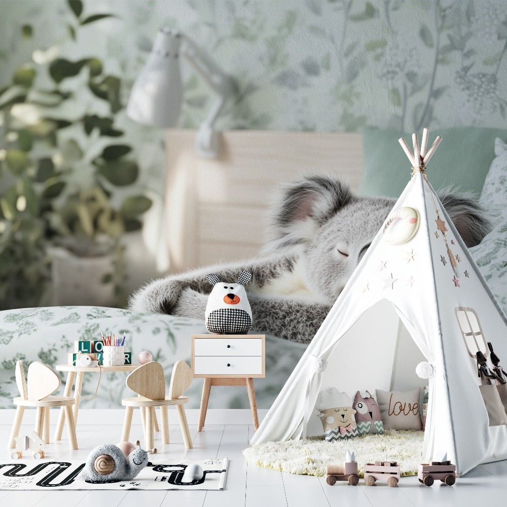 Papier peint koala endormi sur un coussin chambre bebe